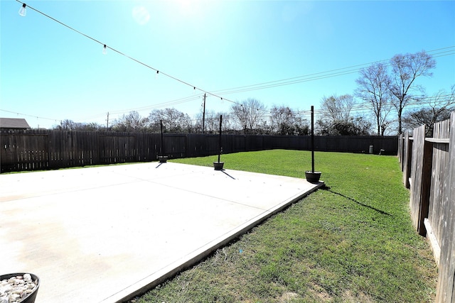 view of yard with a fenced backyard