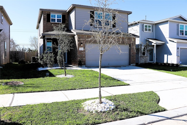 traditional-style home featuring concrete driveway, a garage, brick siding, and a front lawn