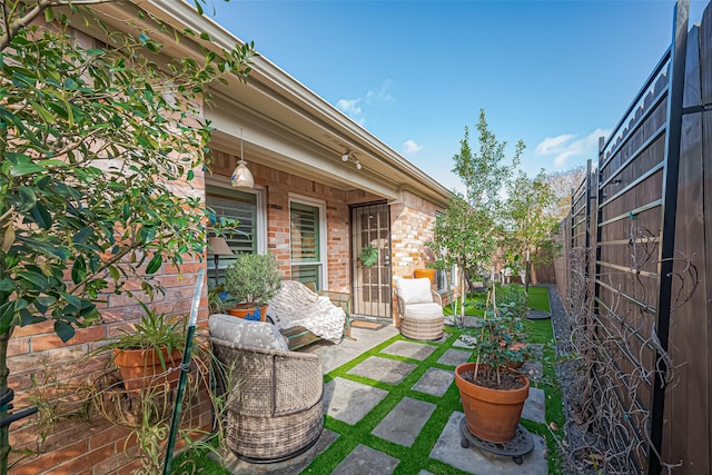 view of yard with a patio area and fence