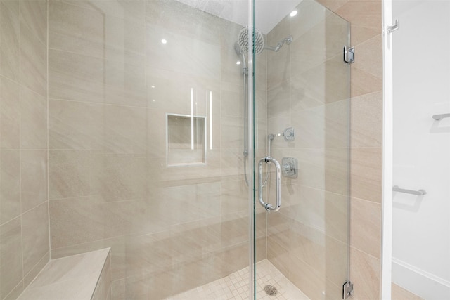 full bathroom with a shower stall