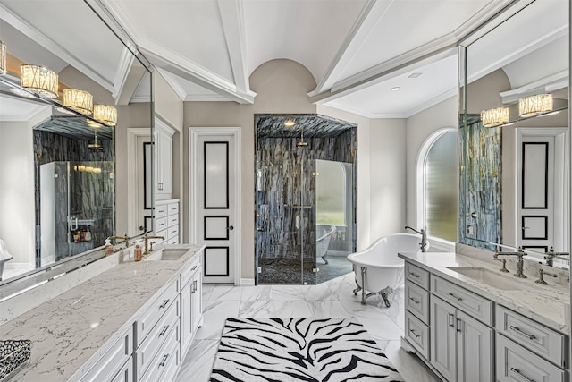 bathroom featuring marble finish floor, a stall shower, two vanities, and a sink