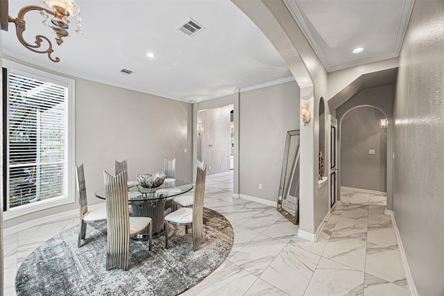 dining space with visible vents, baseboards, ornamental molding, arched walkways, and marble finish floor