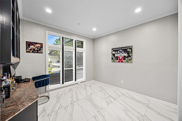 interior space with recessed lighting, baseboards, and ornamental molding