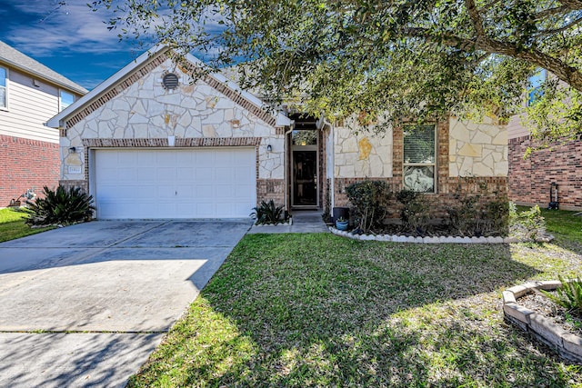 view of front of home with a front yard, driveway, a garage, stone siding, and brick siding