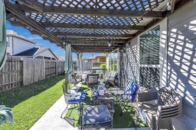 view of patio / terrace with a fenced backyard and a pergola