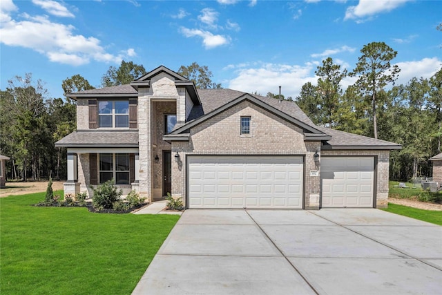 view of front facade with a front yard, driveway, a shingled roof, a garage, and brick siding