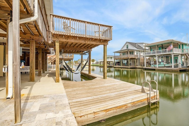 dock area with a water view