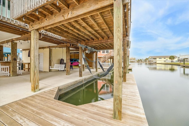 view of dock featuring a water view