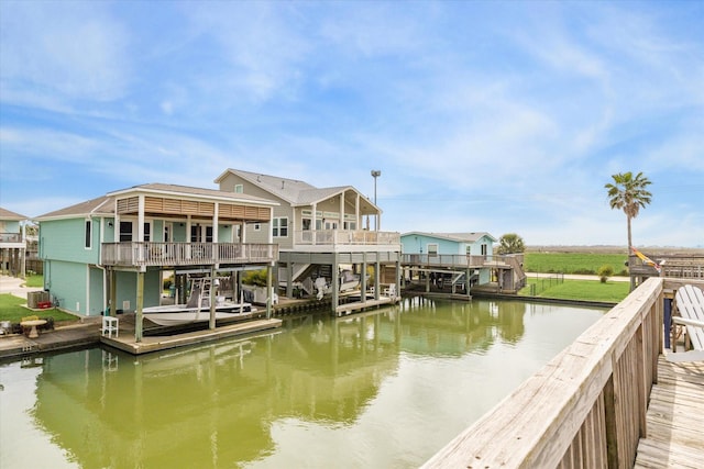 16715 Montego Way, Jamaica Beach, TX 77554 - dock area with a water view and central AC unit