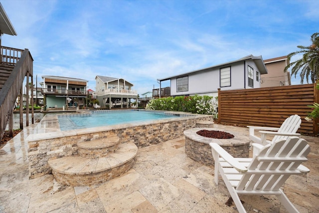 16715 Montego Way, Jamaica Beach, TX 77554 - pool with an outdoor fire pit and a patio