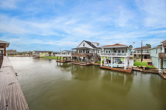 16715 Montego Way, Jamaica Beach, TX 77554 - view of dock with a residential view and a water view