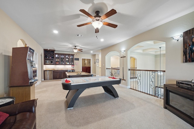 recreation room with baseboards, visible vents, recessed lighting, bar, and light carpet