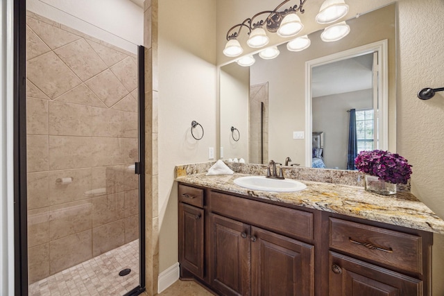 full bathroom featuring ensuite bath, a stall shower, and vanity