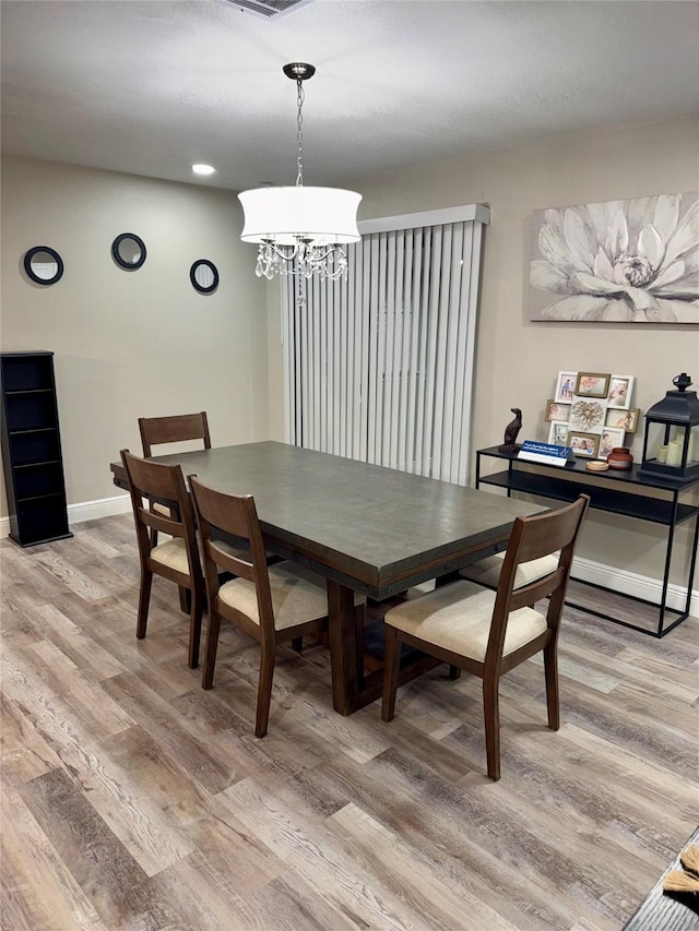 806 Moody Ave, League City, TX 77573 - dining area with visible vents, baseboards, and light wood-style floors