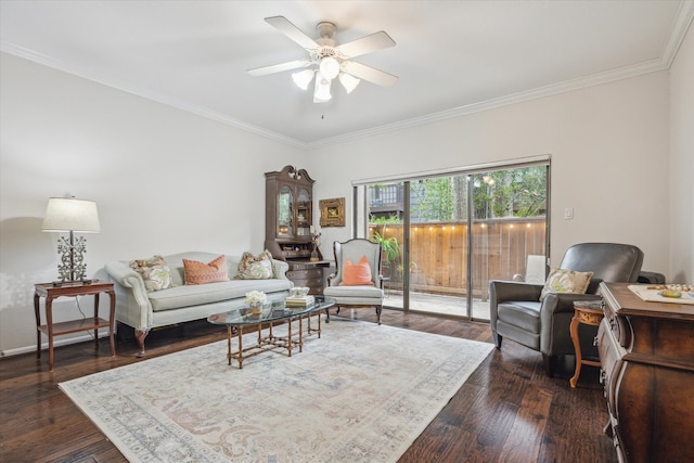 living room with crown molding, ceiling fan, and wood finished floors