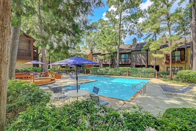 pool featuring a patio area