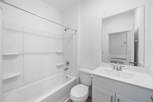 full bathroom with washtub / shower combination, toilet, and vanity