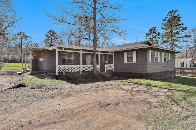 view of front of home with a front lawn