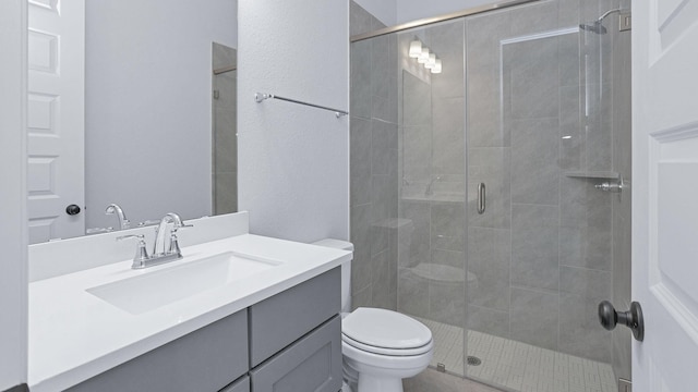 12247 Sweet Gum Dr, Mont Belvieu, TX 77523 - full bathroom featuring vanity and a shower stall