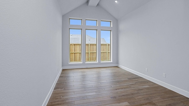 12247 Sweet Gum Dr, Mont Belvieu, TX 77523 - unfurnished room with healthy amount of natural light and dark wood-style floors