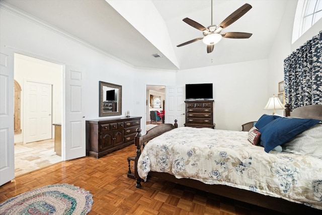 bedroom with ceiling fan, visible vents, and high vaulted ceiling