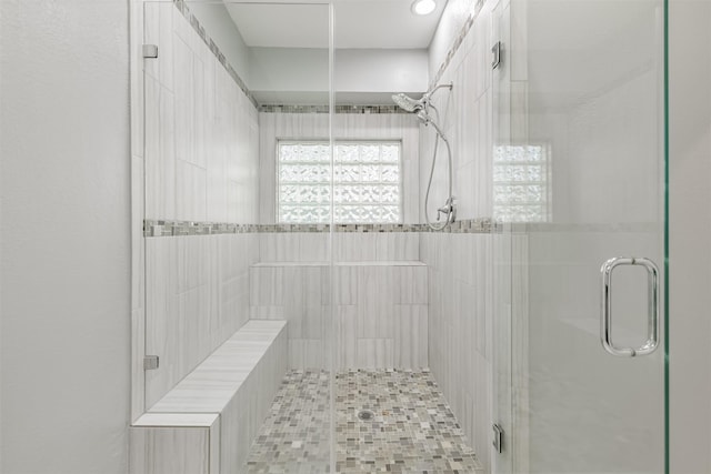 bathroom with a stall shower