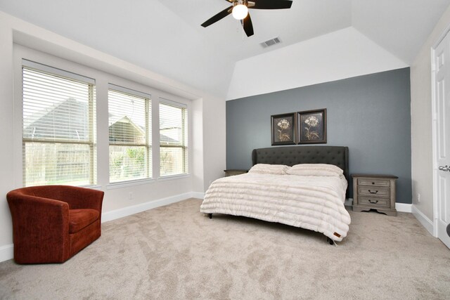 bedroom with visible vents, lofted ceiling, carpet floors, baseboards, and ceiling fan