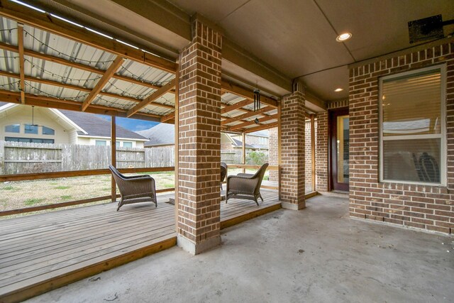 view of patio featuring fence