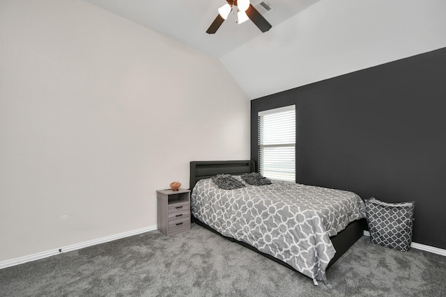 carpeted bedroom featuring visible vents, baseboards, ceiling fan, and vaulted ceiling