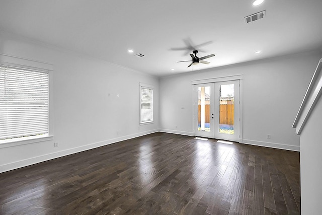 6716 Ave R, Houston, TX 77011 - empty room with french doors, a ceiling fan, ornamental molding, recessed lighting, and dark wood-style flooring