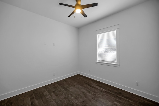 6716 Ave R, Houston, TX 77011 - empty room with baseboards, a ceiling fan, and dark wood-style flooring