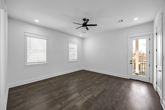 6716 Ave R, Houston, TX 77011 - unfurnished room featuring dark wood finished floors, a ceiling fan, recessed lighting, and baseboards
