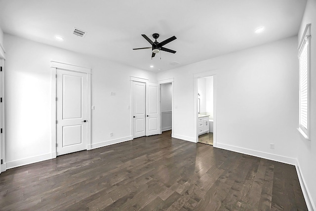 6716 Ave R, Houston, TX 77011 - unfurnished bedroom featuring dark wood-style floors, baseboards, recessed lighting, connected bathroom, and a ceiling fan