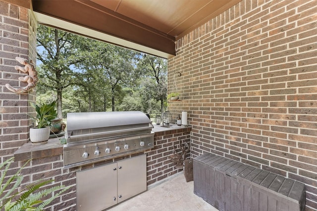 view of patio / terrace with a grill and exterior kitchen