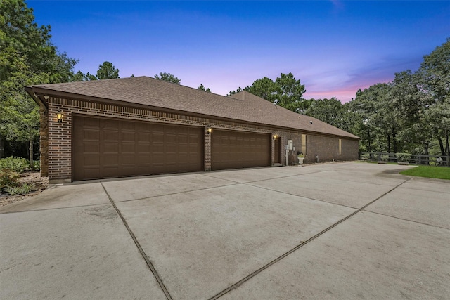 exterior space featuring concrete driveway