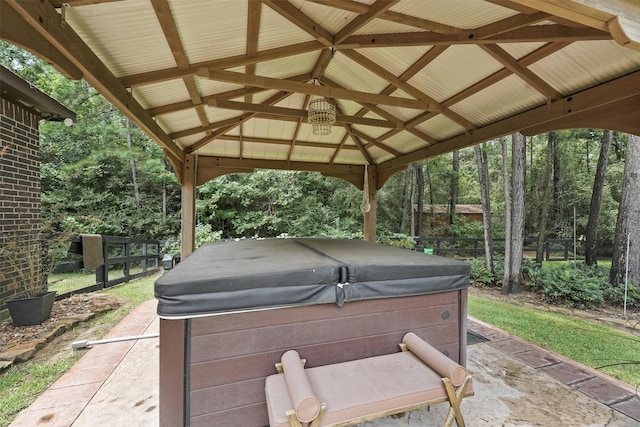 view of patio / terrace featuring a gazebo and a hot tub