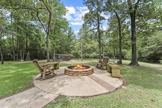 view of patio with a fire pit