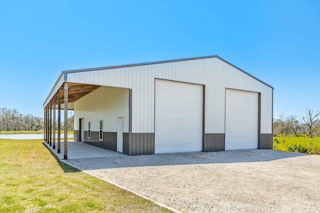 view of outbuilding featuring an outdoor structure and a water view