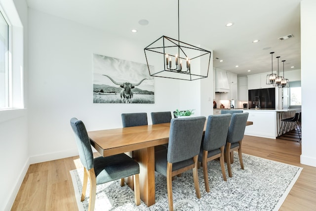 dining area with recessed lighting, visible vents, baseboards, and light wood finished floors