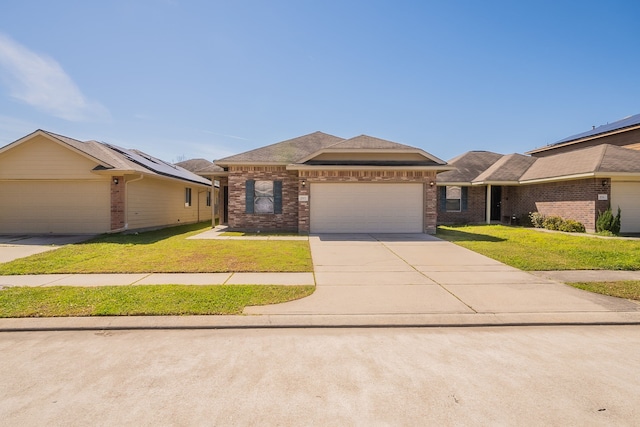 view of front of home featuring brick siding, a shingled roof, a front lawn, concrete driveway, and an attached garage