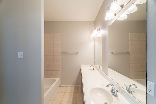 bathroom featuring a sink, a tub, and tile patterned flooring