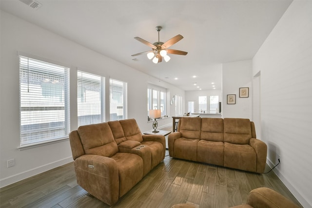 living area with visible vents, a ceiling fan, wood finished floors, recessed lighting, and baseboards