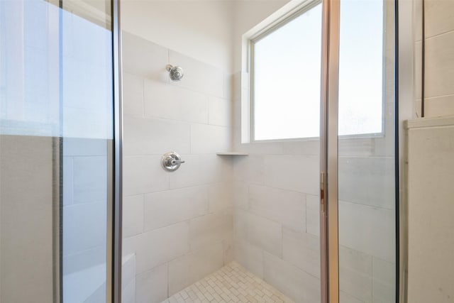 full bathroom featuring a stall shower