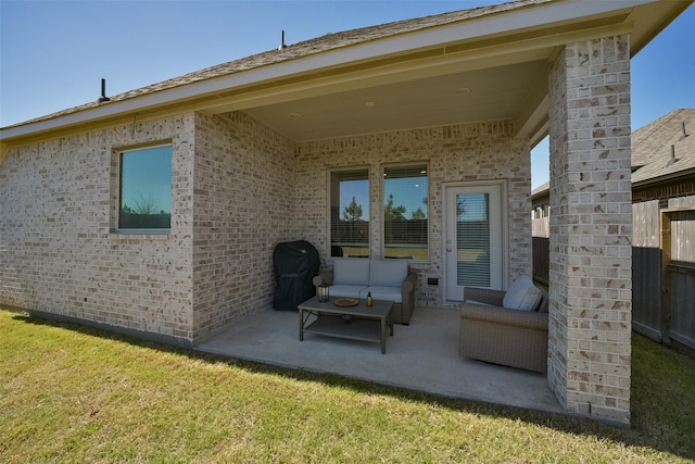 view of patio with a grill and fence