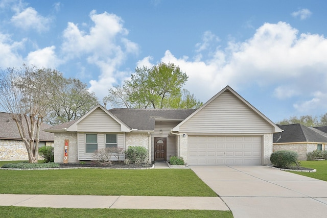 single story home with a front lawn, an attached garage, brick siding, and concrete driveway