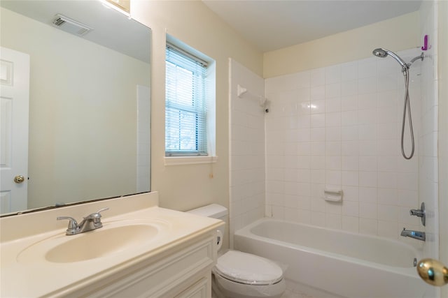 bathroom with visible vents, vanity, toilet, and shower / bathtub combination