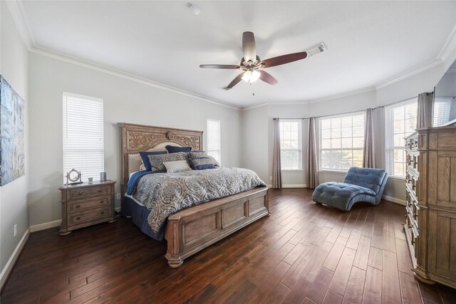 bedroom with visible vents, dark wood-type flooring, baseboards, and ornamental molding