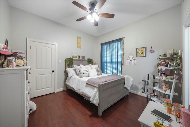 bedroom with dark wood finished floors, baseboards, and ceiling fan