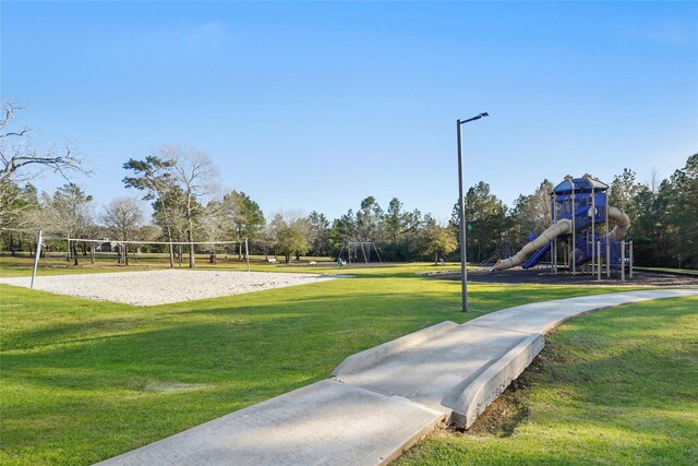 view of community with volleyball court and playground community