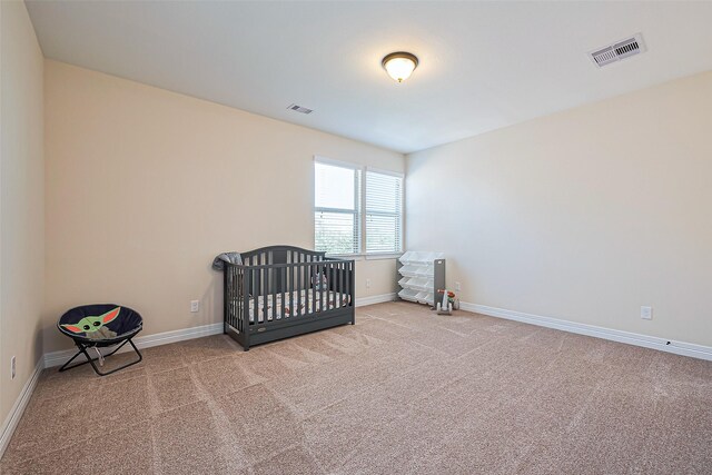 10018 Durango Path Ln, Cypress, TX 77433 - unfurnished bedroom with visible vents, baseboards, and carpet